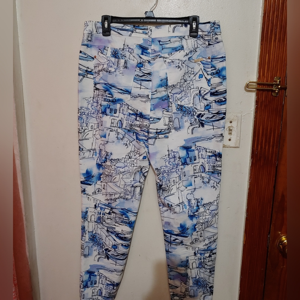 Chico's four pocket, zip up,stretch,  print jeans in Size 2